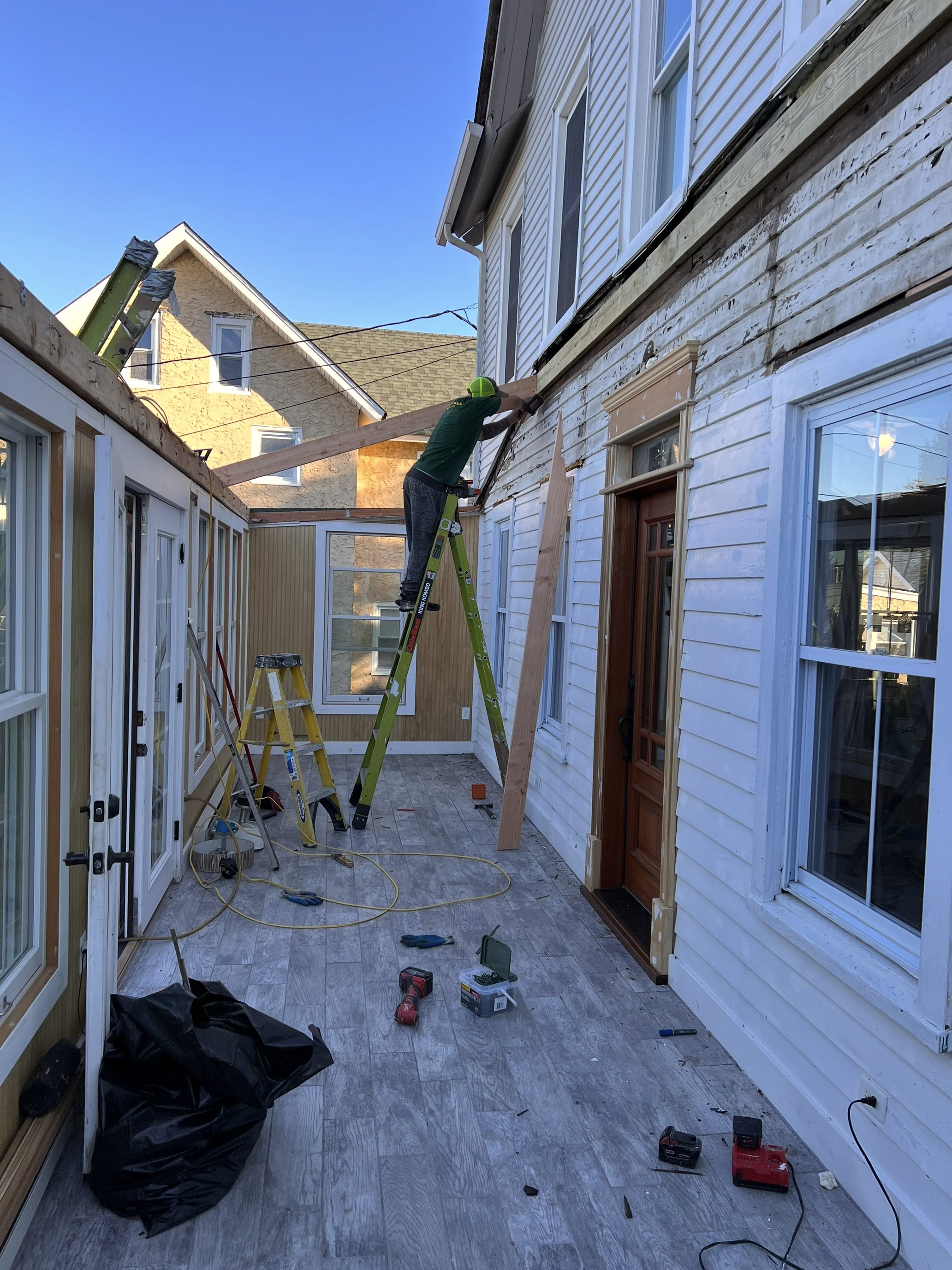 Roofing and carpentry detail work by Murray Brothers crew